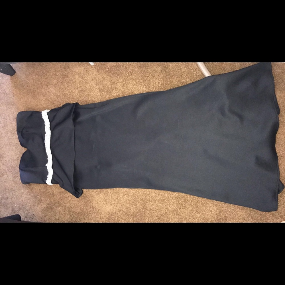 Black peplum dress with stone belt